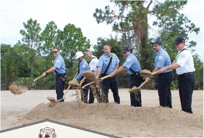 Members of St. Cloud Fire Rescue throw ceremonial dirt Friday to mark the groundbreaking of the department’s new Fire Training Building. PHOTOS/TERRY LLOYD, CITY OF ST. CLOUD