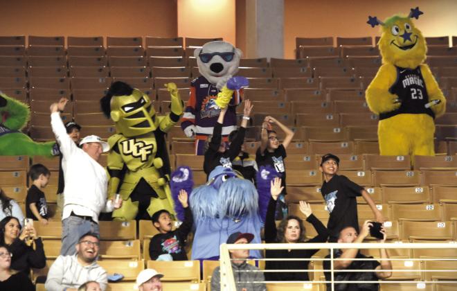 Mascot fun in the stands at Thursday's Osceola Magic game. PHOTOS BY KATIE WILLIAMS