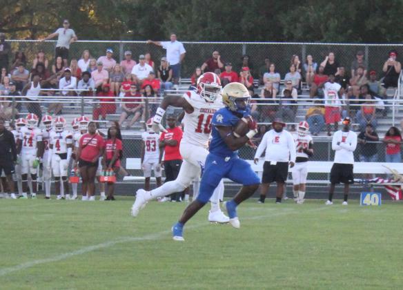 Osceola's Taevion Swint breaks clear for a 64-yard touchdown run in Thursday's spring game against Edgewater. PHOTO/KEN JACKSON