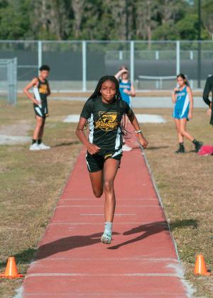 In helping the Seahawks win the county middle school track title, Asaiah Seward broke the county record in the 100 meter hurdles, and Ziannah Gooden ran and jumped to three more titles. PHOTO/DILLON DISTLER