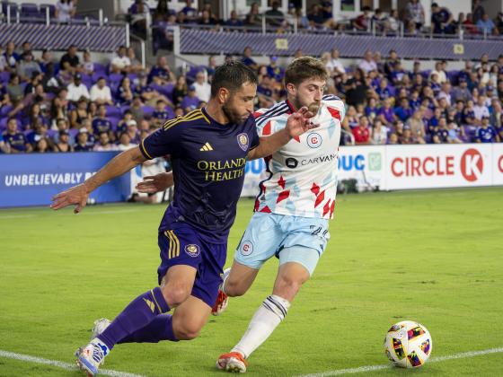 Orlando City's Nicolás Lodeiro fights for the ball in Saturday's 4-2 win over the Chicago Fire in MLS action. PHOTO/MARIO CASAMALHUAPA
